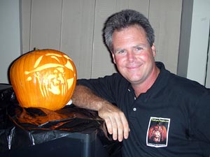 Gene Granata posing next to one of his creations