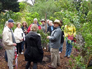 Arnold discussing his fruit tree collection