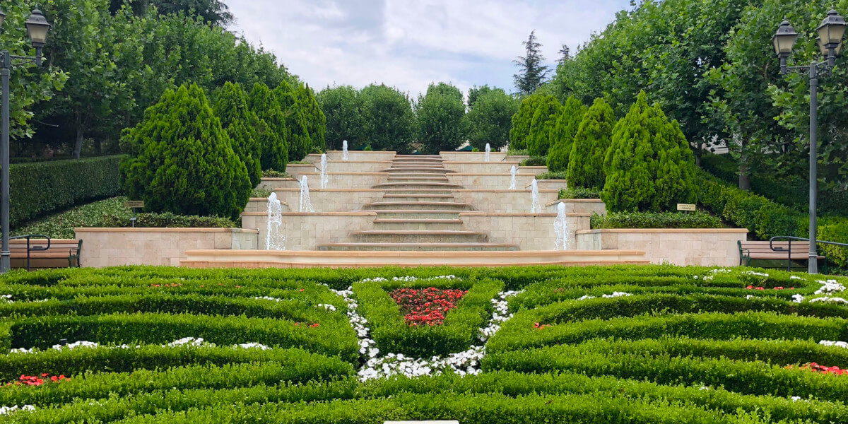 Magnificent, cascading waterfall at Gardens of the World