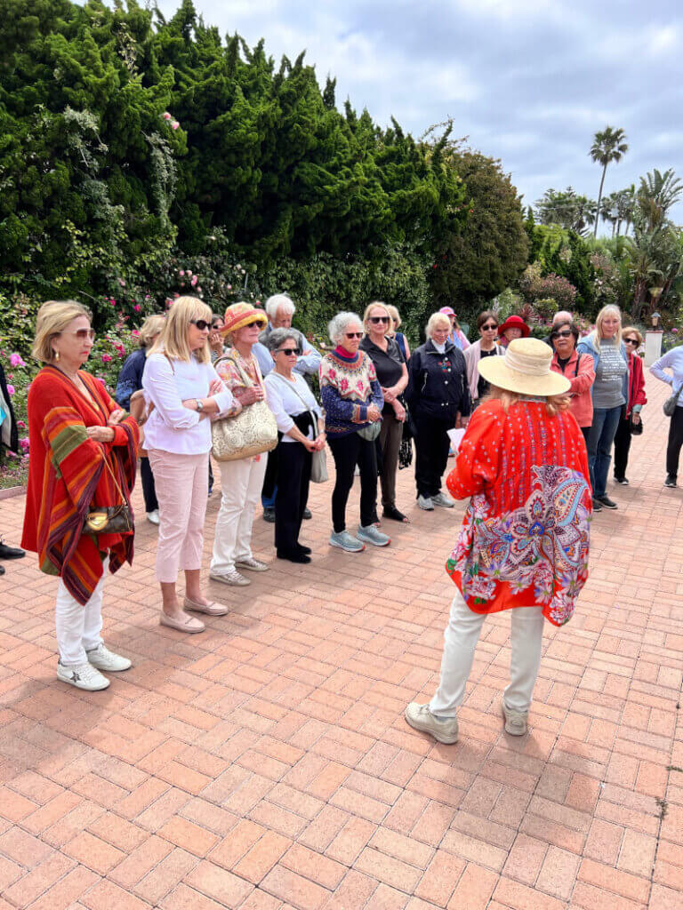 Garden club members touring the rose garden