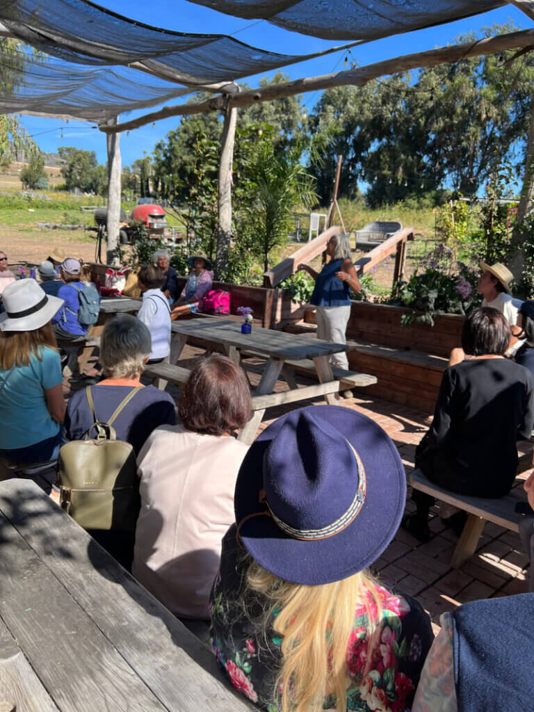 Garden Club members listening to a talk from a staff member of The Sterling Ranch