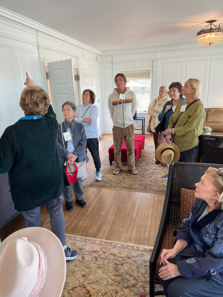 Malibu Garden Club member and Annenberg Beach House docent Linda Androlia telling the stories of the Beach House