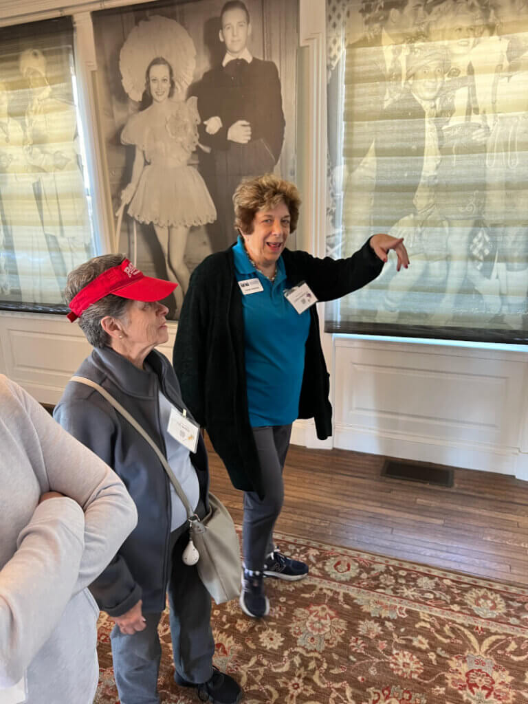 Malibu Garden Club member and Annenberg Beach House docent Linda Androlia telling the stories of the Beach House