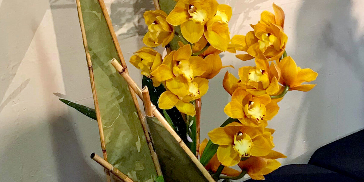 Yellow orchid floral arrangement